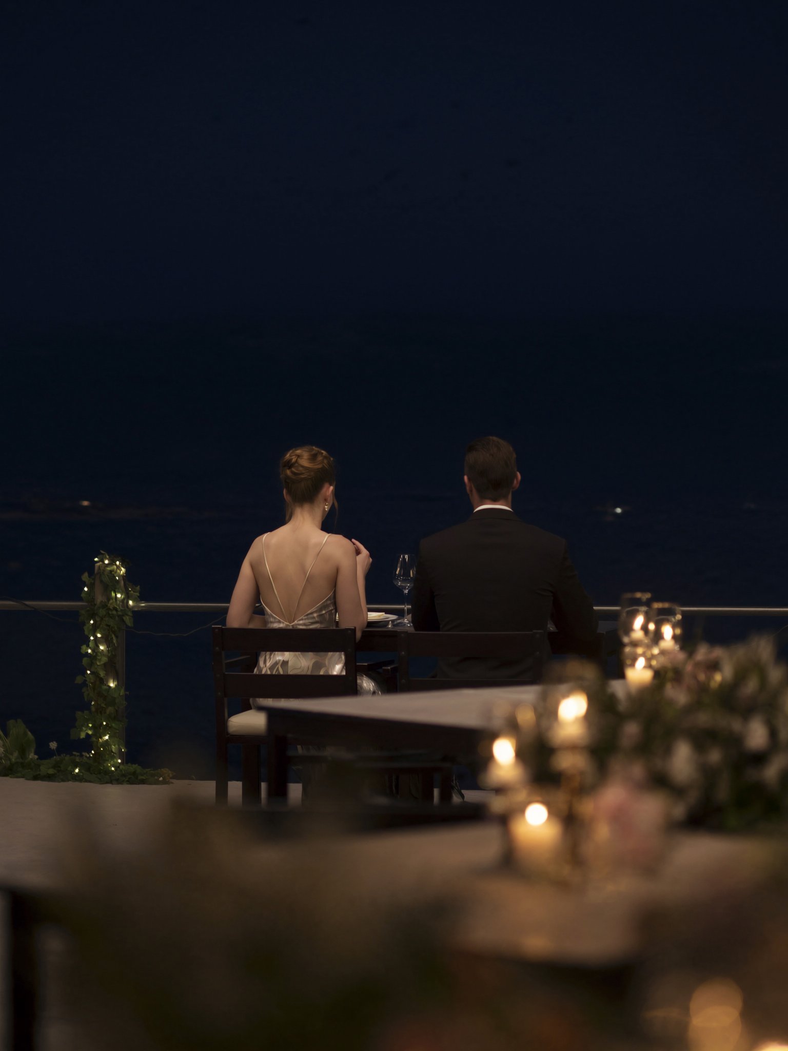 Couple at oceanside dinner